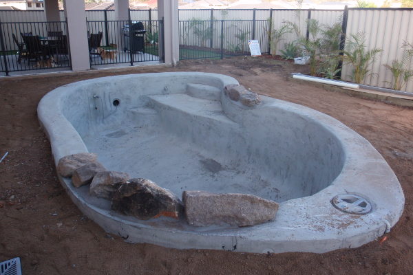 Pool landscaping and bush rock feature built by UC Pools in Brisbane